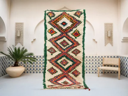 Taziri Azilal rug in cream, orange, blue and black, handmade in Morocco